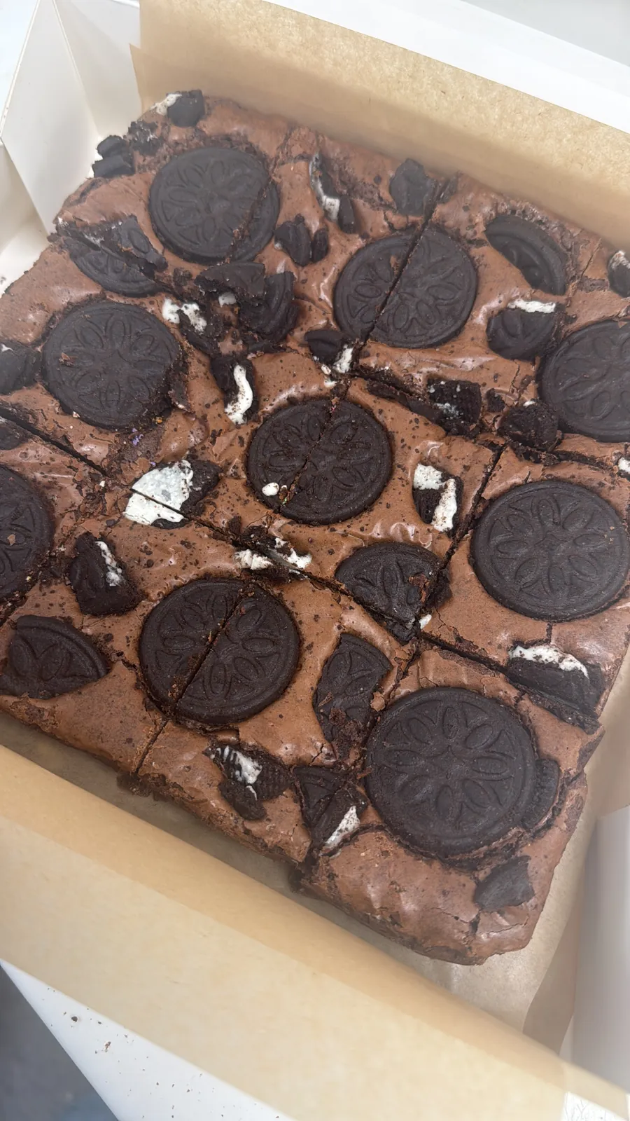 Chocolate brownie traybake topped with Oreo biscuits